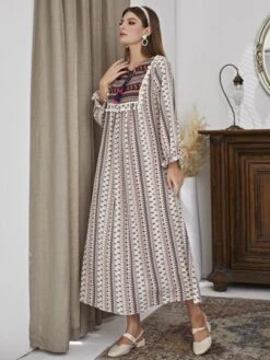 SHEIN Najma Floral & Geo Print Flounce Sleeve Tassel Trim Tie Neck Dress -Curated Swimwear 1638425779d4ec69f9cd22676778233bf9249391d3 thumbnail 405x552