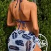 SHEIN Maternity Halter Triangle Bikini Swimsuit & Tropical Print Beach Skirt -Curated Swimwear 1678677283ea7abbe5d1699259244dc359561c2e55 thumbnail 405x552