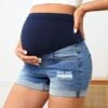SHEIN Maternity Wideband Waist Ripped Roll Up Hem Denim Shorts -Curated Swimwear 16792757061ade58caa457a2403304116afb24d285 thumbnail 405x552