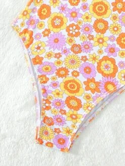 Floral Print Tie Front One Piece Swimsuit -Curated Swimwear 1679276482aabfcde0e6f70c2da5285cf60ddda321 thumbnail 405x552