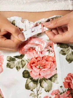 SHEIN Maternity Floral Print Adjustable Waist Split Thigh Wide Leg Pants -Curated Swimwear 1679653655f325069f1642fd19de080b9341323511 thumbnail 405x552