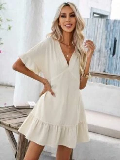 SHEIN VCAY Solid Ruffle Hem Smock Dress -Curated Swimwear 16805045400b2793f6900538677a3fe6324cb740c7 thumbnail 405x552