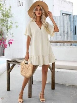 SHEIN VCAY Solid Ruffle Hem Smock Dress -Curated Swimwear 1680504543af952f0546f7d9b8679b8edf5623f52e thumbnail 405x552