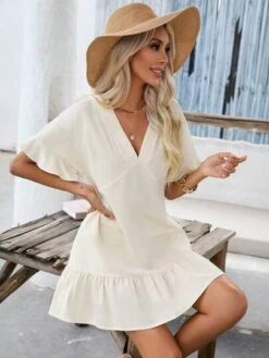 SHEIN VCAY Solid Ruffle Hem Smock Dress -Curated Swimwear 16805045473af3e26a95b0bca5e9771c2b4b656784 thumbnail 405x552