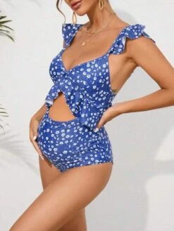 SHEIN Maternity Ditsy Floral Print Cut Out Ruffle Trim One Piece Swimsuit -Curated Swimwear 1683253659da00d08f9c8fe989237df55ce5df884d thumbnail 405x552