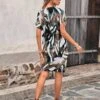 SHEIN Clasi Allover Print Batwing Sleeve Knot Side Wrap Dress -Curated Swimwear 168541713162d872ef2d3987d3d4dcabb64c661fd6 thumbnail 405x552
