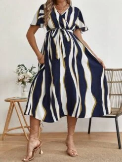 SHEIN Maternity Colorblock Surplice Neck Butterfly Sleeve Dress -Curated Swimwear 1687935004ac500972d40f380071955ed34df50009 thumbnail 405x552