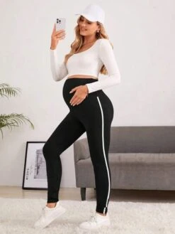 SHEIN Maternity Adjustable Waist Contrast Tape Side Leggings -Curated Swimwear 168810665502ec4cfeb9a3e04a989302937f3f6bad thumbnail 405x552
