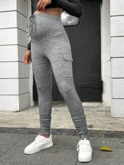 SHEIN Maternity Marled Knit Adjustable Waist Knot Front Flap Pocket Leggings -Curated Swimwear 168869536161827db6b23c47d9ecfbe1a2ee0fae0c thumbnail 405x552