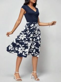 SHEIN Clasi Floral Print Surplice Neck Dress -Curated Swimwear 1689040657f4f76e05a8f99cb9a697fb263ed7bf82 thumbnail 405x552